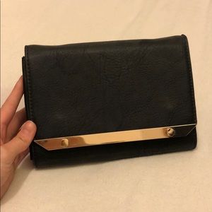 Black and gold crossbody bag